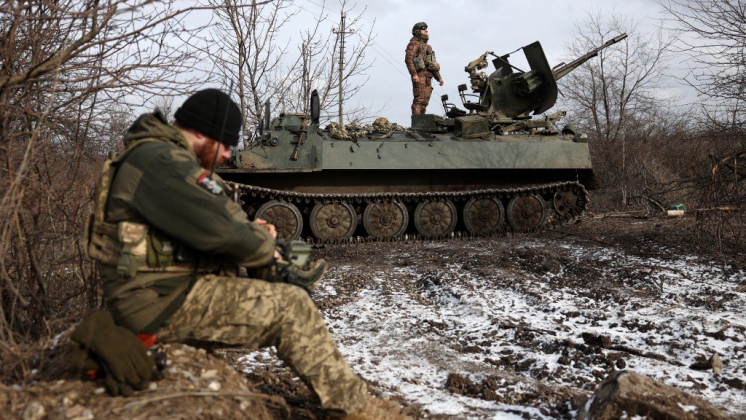 Ukrainian anti-aircraft gunners of the 93rd Separate Mechanized Brigade Kholodny Yar monitor the sky from their positions in the direction of Bakhmut in the Donetsk region, amid the Russian invasion of Ukraine, on February 20, 2024. (Photo by Anatolii STEPANOV / AFP)